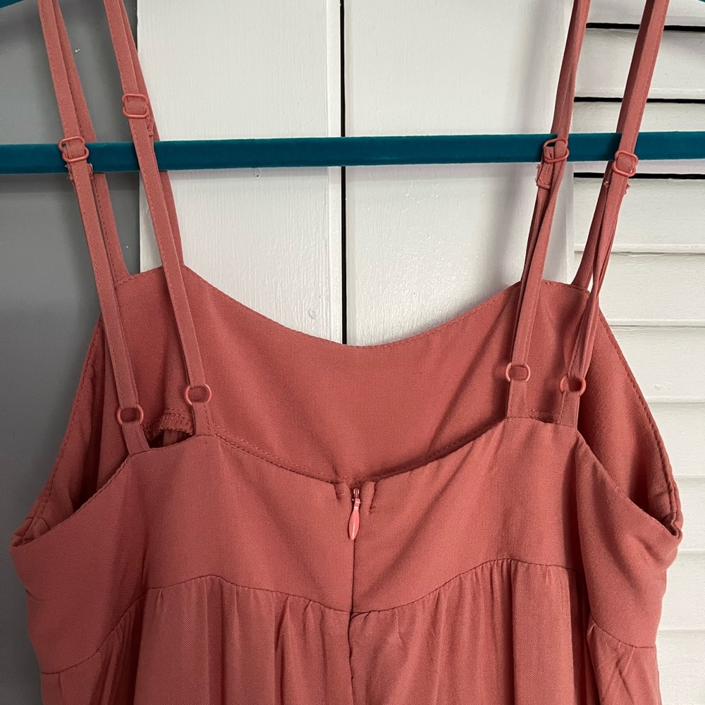 Stunning peachy pink jumpsuit by Earthbound Trading. Double straps and flowy
